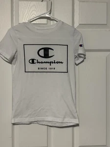 Camiseta Champion Juvenil Niños Manga Corta Talla Mediana Blanca Negra Logo Usada en Excelente Condición - Imagen 1 de 3