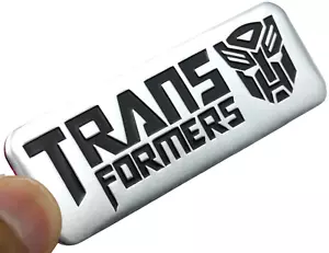 Metal Transformers Emblem Sticker Decal Optimus Prime Tailgate Badge 3" x 1" - Foto 1 di 15
