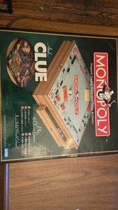 MONOPOLY, CLUE + 6 klassische Spiele im Massivholzschrank - Bild 1 von 3