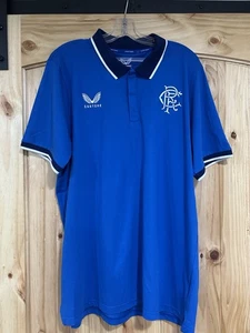 Glasgow Rangers Polo Castore blau 2XL EUC - Bild 1 von 6