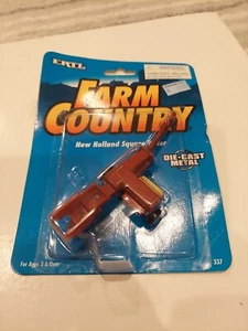 Sealed NOS, Ertl 337 1:64 Farm Country New Holland Square Baler - Picture 1 of 2