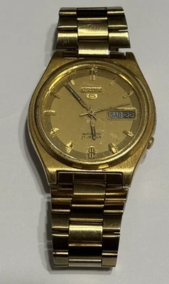 SEIKO 5 7009-3179 A2 día fecha esfera dorada automático funcionando Foto 1 de 4