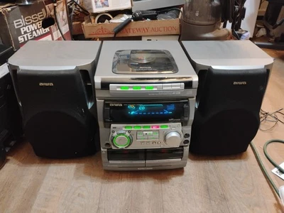 Aiwa CX-NA707 立体声系统 3 光盘 CD 更换器、调幅/调频收音机、双磁带卡座 — 第 1/4 张图片