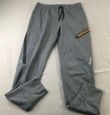 Pantalones de chándal Reebok para hombre gris medio Y2K cordón cremallera bolsillo informales cómodos Foto 1 de 4