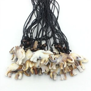 Lote de 12 colgantes colgantes de elefantes tibetanos dijes acrílicos amuleto surfista - Imagen 1 de 12