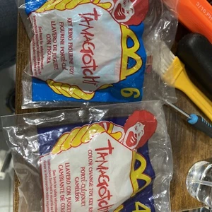 McDonalds Happy Meal Spielzeug 1998 TAMAGOTCHI - NEU/VERSIEGELT #4 & #6 - Bild 1 von 4