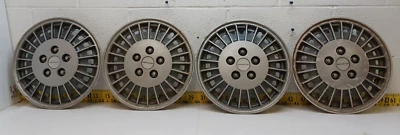 Juego de 4 tapacubos usados OEM GM de 13" Pontiac Grand Am 1985-88 (5490) Foto 1 de 4