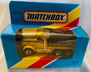 Matchbox-(1-75) - 23h - Peterbilt Quarry Tipper Truck - Yellow - Light Blue Box - Picture 1 of 1