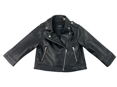 Chaqueta de moto de cuero negra para niños Zara con cremallera plateada y detalles a presión talla 18-24M Foto 1 de 4
