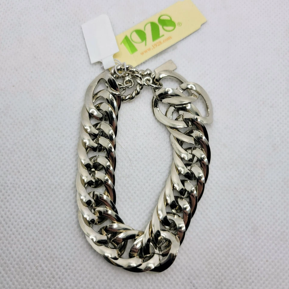 Brazalete de palanca de cadena de eslabones de bordillo tono plata 1928 Foto 1 de 2