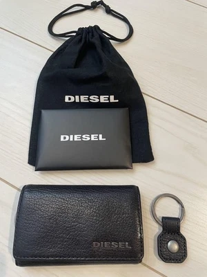 Estuche para llaves Diesel para hombre aspecto de cuero en relieve mini bolsa con anillo y mosquetón Italia Foto 1 de 3