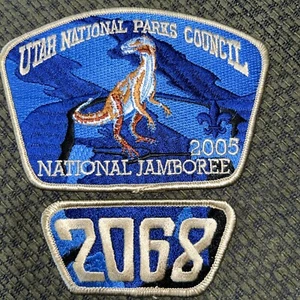 Como nuevo 2005 JSP Utah National Parks Cncl dinosaurio gris tropa fronteriza 2068 2 piezas - Imagen 1 de 1