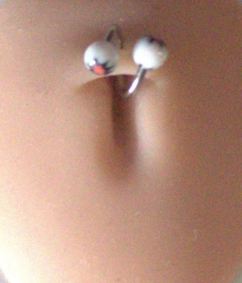 Anillo espiral torcido labio vientre blanco negro naranja brillo UV ráfaga 3/8 estrellas 1-14 g Foto 1 de 4