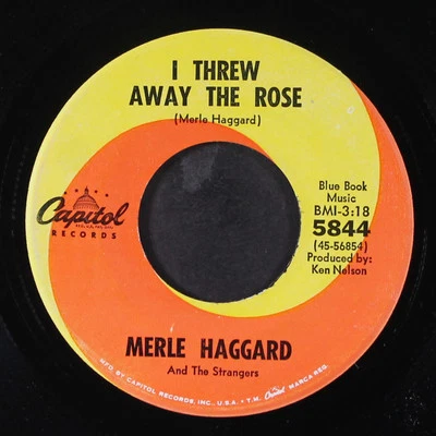 MERLE HAGGARD: i threw away the rose / loneliness is eating me alive CAPITOL 7" - Image 1 of 2