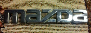 2004-2009 Mazda 3 Emblem Nameplate Script Logo Badge OEM Rear Trunk 05 06 07 08 - Picture 1 of 3