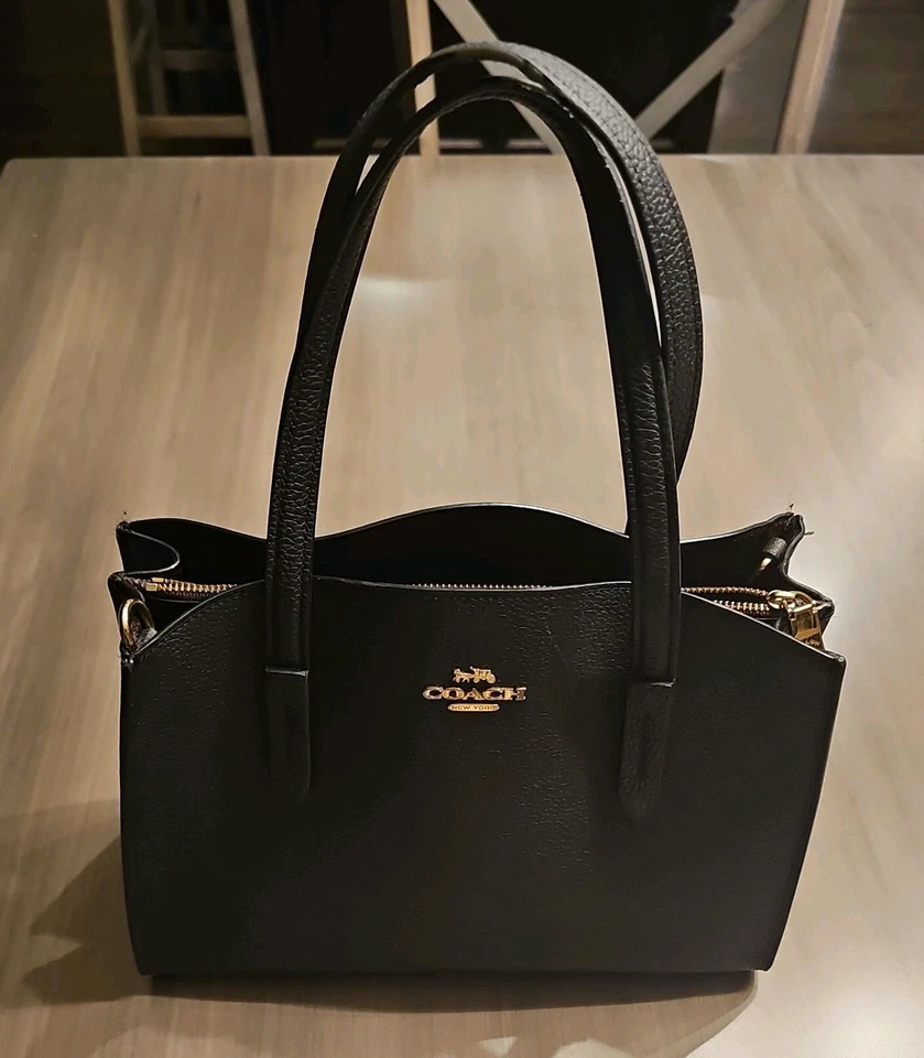 Cartera Coach Charlie 28 negra/dorada 29529 de cuero granulado  Foto 1 de 4