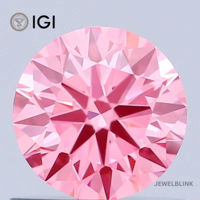 IGI Certified 0.68 Carat Fancy Vivid Pink VS1 Round Cut CVD Lab Grown Diamond - Image 1 of 4