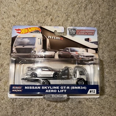 Hot Wheels Nissan Skyline GT-R (BNR34) Aero Lift #12 Premium Team Transport NUEVO Foto 1 de 4