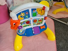bright starts lights baby learn and giggle activity station