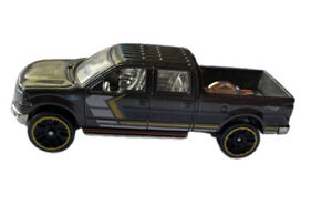 2012 hot wheels ‘09 Ford F-150 black die cast truck