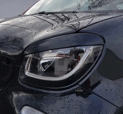Embellecedores de faros smart 453 fortwo forfour Mal de ojo negro homologación - Imagen 1 de 3