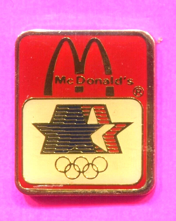 1984 OLYMPIC PIN MCDONALDS DOMED ENAMEL  GOLDEN ARCHES OVER STARS IN MOTION PIN - Image 1 of 1