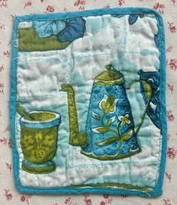 Almohadilla caliente retro vintage de los años 60 verde oliva aguamarina con soporte para tetera y decoración de reloj - Imagen 1 de 3