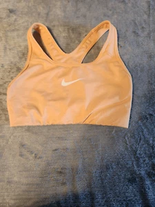 Nike size XS Dri Fit Logo Sports Bra Light Orange - Picture 1 of 3