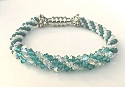 Pulsera con cuentas de cristal de Swarovski y semillas de Toho cierre magnético de acero inoxidable Foto 1 de 4