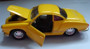 Karmann Ghia 1966 | Maßstab 1:28 | gelb | neu | Türen+Motorhaube zum Öffnen - Bild 1 von 8