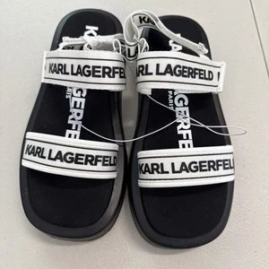 Sandalia Karl Lagerfeld Olek Correa Sin Cordones Talla 7 Negra Blanca Plana Cómoda Nueva Sin Caja - Imagen 1 de 5
