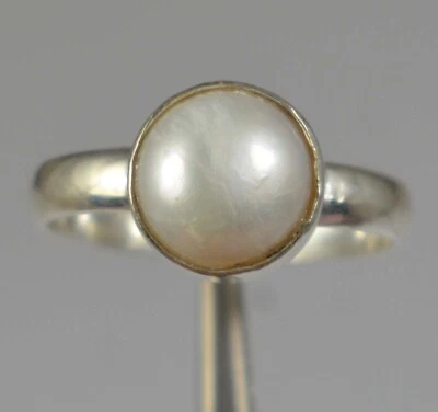 Anillo certificado piedras preciosas redondas de 8 quilates con perlas blancas naturales del Mar del Sur de Tahití Foto 1 de 4