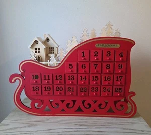 FAO SCHWARZ Advent Calendar Sleigh Drawers 2009 Red Lighted Wooden Tabletop  - Picture 1 of 12