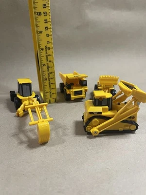 Construction Vehicle Lot of 4 - 1/64 CAT Heavy Equipment Truck Bulldozer Loaders - Image 1 of 4