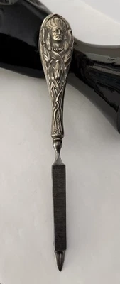 "Antigua lima de uñas con mango de tallo de maíz jefe indio de plata esterlina 7-1/4"" reposada" Foto 1 de 4