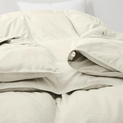 Plumón de ganso blanco premium ligero a pesado Foto 1 de 4