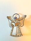Vintage Rhinestone and gold tone metal Angel pin with hymnal 