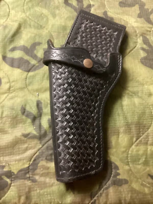 FUNDA DE COLECCIÓN SMITH & WESSON CUERO NEGRO RESISTENTE B07 35WlH BASKETWEAVE mano izquierda Foto 1 de 2