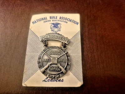 NEW ON CARD  VINTAGE NRA Junior Division Marksman Pin National Rifle Association - Image 1 of 2