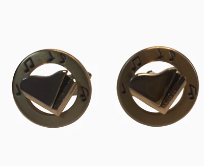 Gemelos de cola marca Swank vintage tono dorado y notas musicales negras 3/4" Foto 1 de 3