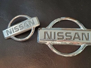 Nissan Chrome Emblems OEM F3XA-16B621 & 62889 OE700 Used - Bild 1 von 7