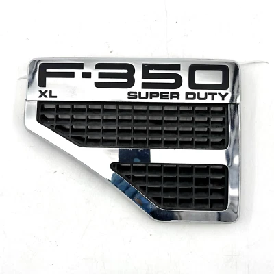Insignia emblema guardabarros izquierdo Ford F-350 Super Duty XL con rejillas de ventilación cromadas 2008-2010 OEM Foto 1 de 2