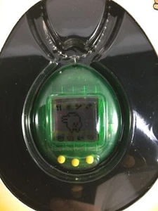 New Bandai Original TamaGotchi clear green 1996 - 1997 English - Picture 1 of 4