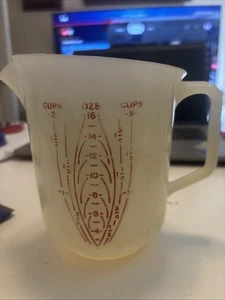Vintage 50er Jahre Tupperware #134 2 Tassen Messkanne mit erhöhtem rotem Schriftzug - Bild 1 von 8