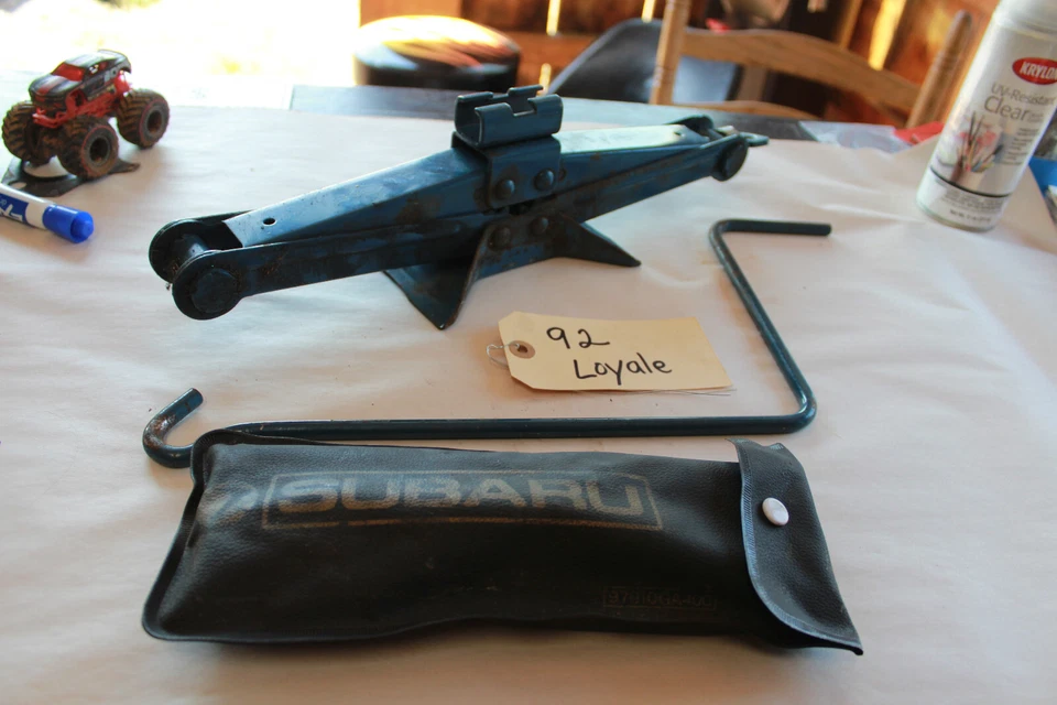 1991 1992 1993 1994 Subaru Loyale Gato de rueda original con herramientas OEM Foto 1 de 4