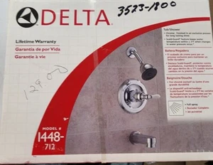 Delta tub and shower faucet (Model 1448 712/715CB) - Picture 1 of 3