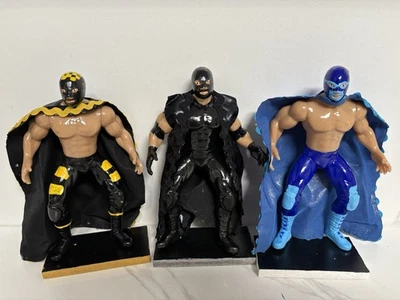 Juego de 3 figuras de luchadores mexicanos de 7" Jaque Mate, El asesino, Aníbal Lucha Libre Foto 1 de 4