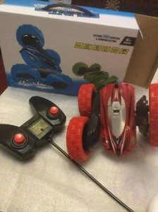 Titans 360 tumbling & spinning Double-Side Roll Remote Control stunt car Red - Picture 1 of 11
