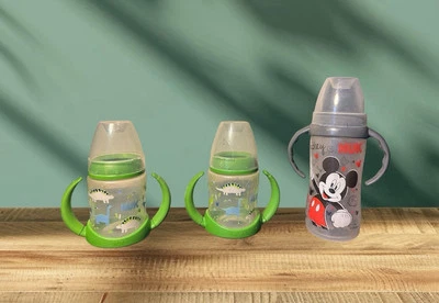 NUK - 2-5 OZ, 1-10 OZ; dinosaurios y Mickey, asas, tapas, sin caños Foto 1 de 4
