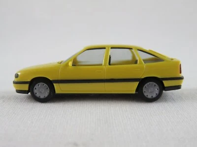 Herpa Opel Vectra A GL Fließheck (1989-1992) in gelb 1:87/H0 unbespielt - Bild 1 von 4
